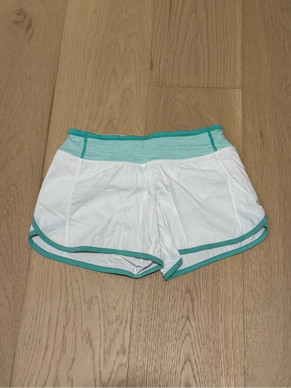 Lululemon Athletica White Shorts with Teal Trim
